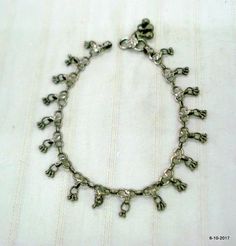 VINTAGE ANTIQUE HANDMADE TRIBAL OLD SILVER FLEXIBLE CHAIN ANKLET (SANKALI OR PAIZEB) FROM RAJASTHAN INDIA. GREAT TO WEAR FOR BELLY DANCE AND FOR OLD TRIBAL JEWELLERY COLLCTION.Length - 28 cm(11") we can adjust the length.width include bells - 1.6 cm(0.63") weight - 23.5 gramsmaterial- silver and original old worn piece. Silver Bohemian Anklets For Festivals, Bohemian Silver Anklets For Festivals, Bohemian Metal Anklets With Silver Beads, Traditional Adjustable Metal Anklets, Adjustable Metal Traditional Anklets, Bohemian Metal Anklets With Oxidized Finish, Silver Bohemian Metal Anklets, Bohemian Metal Anklets For Rituals, Bohemian Metal Toe Ring Anklets