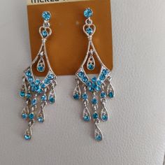 Never Worn Nwt Blue Rhinestone Dangle Earrings, Blue Dangle Earrings With Rhinestones, Blue Metal Earrings With Rhinestones, Blue Crystal Pierced Earrings, Sparkling Blue Dangle Earrings, Blue Crystal Rhinestone Earrings, Nickel-free Blue Crystal Earrings, Nickel Free Blue Crystal Earrings, Sparkling Blue Crystal Earrings