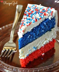 a close up of a slice of cake with red, white and blue frosting