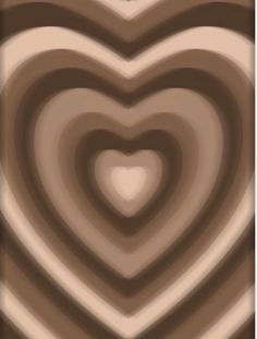 a heart shaped object is shown in brown and white