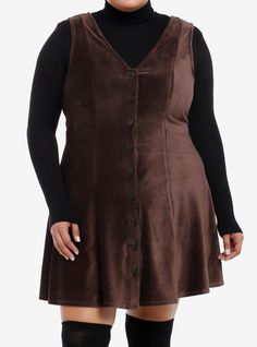 Make room for the cozy cottage dress of your dreams! This brown corduroy dress has a V-neckline and features buttons down the front. Perfect for layering over a cozy long-sleeve! Shirt not included.95% polyester; 5% spandexWash cold; dry lowStretchy materialImportedModel is 5'10"Model wears size 1 Simple Dress Plus Size, Gathered Bust Dress, Christmas Plus Size Outfits, Plus Size Dark Academia Fashion, Nonbinary Fashion Feminine, Brown Sweater Dress Outfit, Midsize Fashion Fall, Corduroy Dress Outfit, Brown Corduroy Dress