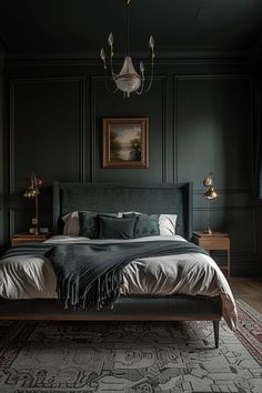 a bedroom with dark green walls and a large bed