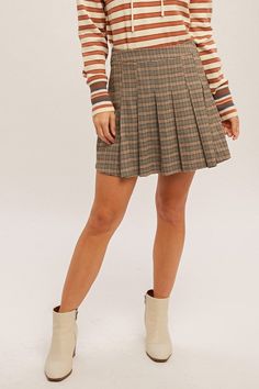 Your new fall favorite is here! Our Honey Plaid Pleated Mini Skirt features a classic design with the cutest detail. Pair with a sweater and knee high booties for the perfect fall activities outfit! Fabric Contents: 97% POLYESTER 3% SPANDEX Model: HEIGHT 5'8" WEARING A SMALL SIZE Activities Outfit, Plaid Pleated Mini Skirt, Plaid Pleated Skirt, Fall Activities, Honey Brown, Plaid Mini Skirt, Brown Plaid, Fall Favorites, Kimono Jacket