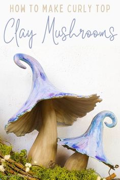 two blue mushrooms sitting on top of moss covered ground with the words how to make curly top clay mushrooms