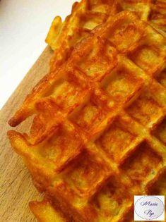 some waffles are sitting on a cutting board