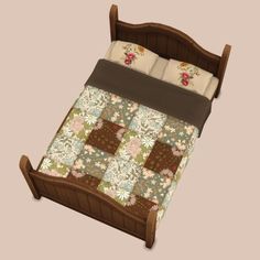 a small bed with two pillows on it's sides and a pillow case in the middle