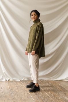 Our classic boucle knit jumper, with a roll neck and made from a 60% wool mix; perfect for layering in the chillier months. Features a flecked detail to the knit, an unbalanced hemline, dropped shoulder sleeves and a small Olive tab stitched to one side of the seam. The boucle is boxy in cut and is made for a relaxed and slouchy fit. Cord Pants, Miss Moss, Warming Up, Mode Inspiration