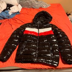 Argonaut Shiny Puffer Jacket Black White And Red Bought Out Of Atlanta Never Worn Still Brand New But Removed Tags (Price Negotiable) Black Quilted Down Outerwear, Quilted Black Down Outerwear, Black Quilted Hooded Puffer Jacket, Black Quilted Puffer Jacket For Winter, Black Quilted Hooded Outerwear, Quilted Black Hooded Outerwear, Black Long Sleeve Puffer Jacket For Winter, Red Nylon Puffer Outerwear, Red Winter Puffer Jacket With Zipper