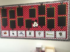 a bulletin board with mickey mouse pictures on it