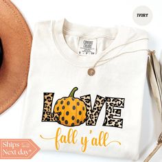 All of our Love Fall Y'All t-shirts are handmade to order on an ultra soft shirt that will quickly become your go to apparel item! You will never want to take it off! Our Thanksgiving tee's are printed with eco-friendly water based ink that feels good and lasts longer!  ♥The details♥ This unisex t-shirt is crafted from soft, breathable fabric for ultimate comfort. Printed with an eco-friendly water-based ink, this shirt not only looks great but also supports sustainable practices. The unisex sizing allows for a versatile fit, but we suggest sizing up for a more relaxed look. To keep your shirt looking its best, we recommend washing it on cold and either hanging it to dry or tumble drying it on low heat. Be sure to avoid ironing directly on the design to preserve the vibrant print. For a pe White T-shirt For Fall Season Gift, White T-shirt For Fall Gift, White T-shirt As A Fall Gift, White Custom Print Shirt For Fall, Thanksgiving Tee, Hello Pumpkin, Family Thanksgiving, Thanksgiving Shirt, Love Fall