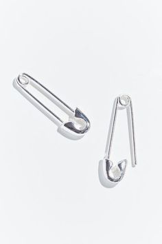 two pairs of ear hooks on a white background