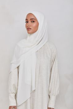 This Chiffon LITE Hijab is our lightest chiffon hijab yet. This lightweight chiffon features a subtle textured finish to hold it in place, and is perfectly wearable for everyday styles. Features lightweight sheer - opaque when folded subtle texture Measurements Standard: approx. 180 cm x 70 cm (70" x 27") Chiffon Hijab, Maxi Dress Sale, White Chiffon, Linen Maxi Dress, Subtle Textures, Everyday Fashion, Beautiful People, Dresses For Sale, Chiffon