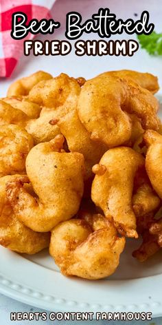 fried shrimp on a plate with text overlay that reads beer battered fried shrimp hearts content farmhouse