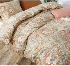 the comforter is neatly made and ready to be used in this bedding set