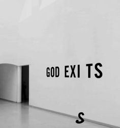 an open door with the words god exit s in black and white letters on it