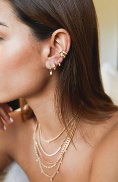 This think, rounded ear cuff makes a bold accessory in high-shine 14-karat gold. 1/4" width 14k gold Made in the USA Eat Cuff Piercing, Gold Ear Stack Aesthetic, Ear Stacks Gold, Gold Ear Piercings, Pretty Stacks, Jewelry Portrait, Piercing Party, Adinas Jewels, Earring Aesthetic