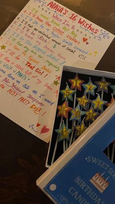 a bunch of birthday cards are on the table