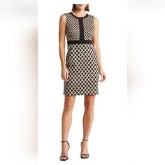 Elevate Your Wardrobe With This Stunning London Times Geometric Sleeveless Dress In Black And Gold. Perfect For Any Occasion, From Casual To Formal, This Dress Features A Crew Neckline, Pullover Closure, And Falls Above The Knee. The Dress Is Made Of 89% Polyester, 9% Rayon, And 2% Spandex, Ensuring Comfort And Durability. Complete With A Hipster, Designer, Christmas, Metal, Classic, City, And Parisian Theme, This Dress Is Perfect For Any Season, Whether It's Winter, Summer, Fall, Or Spring. The Fitted A-line Sleeveless Dress In Brown, Fitted A-line Sleeveless Brown Dress, Sleeveless Brown Mini Dress For Work, Brown Sleeveless Mini Dress For Work, Fitted Sleeveless Brown Dress For Work, Fitted Brown Sleeveless Dress For Work, Brown Fitted Sleeveless Dress For Work, Gold Mini Dress, Designer Christmas