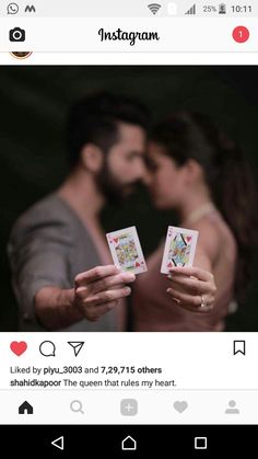 two people holding cards in their hands with the caption instagram on top of them