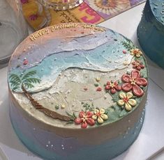 a decorated cake sitting on top of a table