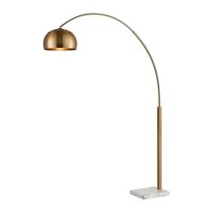 a gold floor lamp with a marble base