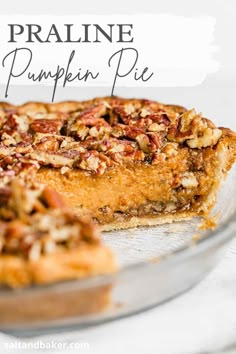 a close up of a pie on a plate with the words, pralie pumpkin pie