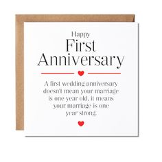 a card with the words happy first anniversary written in red and black on top of it