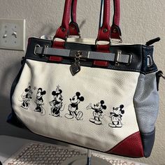 Disney 2014 “Love Story” Handbagcute Mickey & Minnie Purse. Does Not Have A Crossbody Strap With It. Very Good Condition. Interior Is Clean. Beautiful Bag. Paw Wallpaper, Disney Bags, Disney Handbags, Mickey Minnie, Beautiful Bags, Crossbody Strap, Love Story, Satchel, Bag Lady