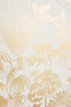 the wall paper is gold and white with an animal pattern on it's side