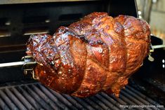 the meat is being cooked on the grill