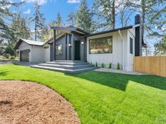 a house that has grass in front of it