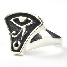 Egyptian symbol for the Eye of Horus Finger size 7* 925 sterling silver with matte antiquing Handmade by Goldmakers Fine Jewelry our Lawrence, Kansas studio. *This ring is an in-house molded design and can therefore be special ordered at sizes 5-9, If you would like to have this ring made in a different size, just send us a message. Goldmakers Jewelry Mission Statement Goldmakers Jewelry creates and curates a comprehensive selection of artfully designed hand-crafted jewelry out of our Lawrence, Kansas studio and boutique. We aspire to offer the jewelry enthusiast access to affordable classics as well as fresh innovative designs! Symbolic Engraved Sterling Silver Ring In Antique Silver, Symbolic Sterling Silver Engraved Ring, Symbolic Hand Cast Silver Engraved Ring, Classic Hand Cast Sterling Silver Rings, Nickel Free Antique Silver Symbolic Ring, Symbolic Engraved Ring With Oxidized Finish, Symbolic Engraved Ring With Oxidized Finish For Promises, Antique Hand Cast Sterling Silver Rings, Classic Sterling Silver Hand Cast Rings