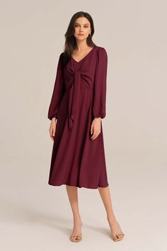 Radiate feminine charm in this dress. The delicate bow-knot detail adds a touch of sweetness, while the long sleeves provide a cozy and modest look. Perfect for any occasion, this midi dress effortlessly combines comfort and fashion.Material : 98%Polyester+2%ViscoseElasticity : NoneSku : CL2433A23*Package : 1*DressCare instructions:Do Not Bleach.Separate dark colors.Iron Low Heat. Chic Long Sleeve Dresses With Bow, Long Sleeve Dress With Bow For Fall, Long Sleeve Fall Dress With Bow, Fall Knee-length Dresses With Bow, Chic Long Sleeve Midi Dress With Bow, Red Long Sleeve Dress With Bow, Chic Midi Dress With Bow For Brunch, Feminine Red Midi Dress For Fall, Bodycon Floral Dress