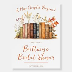 a welcome card for the bridal shower with books and flowers on top of it