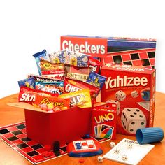 a wooden table topped with lots of toys and games