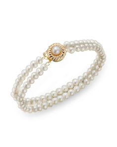 This elegant double-stranded bracelet features cultured freshwater pearls with a 14K yellow gold clasp. Double Strand Pearl Drop Jewelry, Formal Akoya Pearl Bracelet Jewelry, Timeless Double Strand Jewelry For Formal Occasions, Formal Akoya Pearl Bracelet, Fine Jewelry Pearl Bracelet For Anniversary, Elegant Double Strand Pearl Drop Jewelry, Elegant Yellow Gold Akoya Pearl Bracelet, Elegant Multi-strand Yellow Gold Jewelry, Elegant Yellow Gold Multi-strand Jewelry