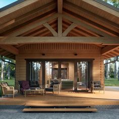 an outdoor living area with wooden furniture and large windows