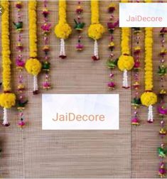 an overhead view of yellow flowers and beads on a wall with the words jaidecorre above it