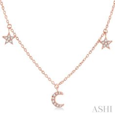 A dainty diamond necklace, this offers instant appeal. It features moon crescent and star charms, placed at intervals for a delicate and pretty look. There are three crescents with a star charm each between them, total 2 stars. A total of 36 round cut diamonds decorates the charms, 14 micro wall set and 22 pave hand set. Each crescent is embellished with 8 diamonds, while each star is adorned with 6 round cut diamonds. An 18-inch cat chain holds these lovely charms. The necklace is fashioned in 14 karat rose gold. Total diamond weight is 1/8 ctw. Moon Crescent, Dainty Diamond Necklace, Stackable Wedding Bands, Trending Engagement Rings, Star And Moon, Engagement Rings Bridal Sets, Band Jewelry, Station Necklace, Jewelry Repair