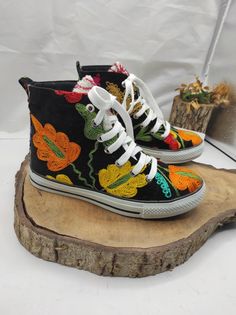 Handmade vintage high top sneakers. Every size available. #hightopsneakers #sneakers #tennisshoes #womenshoes #sportshoes #vintage #womenfashion #forher Spring Sneakers With Multicolor Embroidery And Appliques, High-top Multicolor Embroidered Sneakers, High-top Embroidered Multicolor Sneakers, Casual Sneakers With Multicolor Embroidery And Appliques, Casual Sneakers With Multicolor Embroidery And Round Toe, Multicolor Embroidery Sneakers For Spring With Round Toe, Multicolor Embroidered Spring Sneakers With Round Toe, Lace-up Sneakers With Multicolor Embroidery And Embroidered Logo, Spring Multicolor Embroidered Sneakers With Round Toe