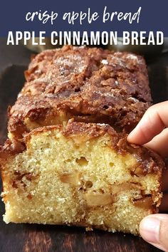 a close up of a person holding a piece of apple cinnamon bread