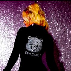 This Beautiful Black Fitting Dress Featuring The Care Bears Logo Big And Glittery Made Of Rhinestones Placed To Cover The Whole Back Is A Must-Have For Any Fan Of The Beloved Care Bears Characters And Their Soft Hugs! The Dress Is Designed With Long Sleeves And Fur Cuffs For A Comfortable And Stylish Look. It Also Has A Fur Collar And One Button Closure, Adding To Its Unique And Comfy Night Out Look. The Dress Comes In All Sizes S,M,L,Xl And Is Perfect For Casual Occasions Or A Night Out In Town Black Fitting Dress, Care Bears Logo, Care Bears Characters, Care Bear Dress, The Care Bears, Bears Logo, Fur Cuffs, Bear Character, Bear Logo