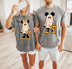 Retro Mickey Minnie Halloween Couple Shirt, Mickey Ghost T-Shirt, Minnie Ghost T-Shirt, Spooky Season Sweatshirt, Halloween Gift, Ghost Tee Welcome to our Etsy T-Shirt Store! At our store, we are passionate about bringing you high-quality, unique, and stylish t-shirts that allow you to express yourself and stand out from the crowd. Our carefully curated collection features a wide range of designs, from trendy and modern to vintage and nostalgic, ensuring there's something for everyone. Quality i Halloween Mickey Mouse Short Sleeve T-shirt, Halloween Mickey Mouse Crew Neck Top, Fall Mickey Mouse Crew Neck T-shirt, Mickey Ghost, Disney Couple Shirts, Halloween Couple, Ghost Tee, Couples Halloween, Couple Shirt