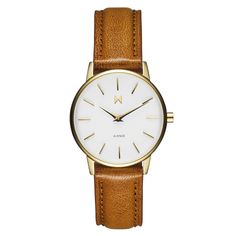 The Avenue Collection’s Pretty And Petite Design Is Inspired By The Classic Style Of New York. Timeless Women’s Timekeeping Meets An Italian Tan Pebbled Leather Strap, Gold Case, And White Dial. | Avenue Women’s Watch — Italian Tan Color Story | MVMT Mvmt Watches, Timeless Watches, Mens Watches Leather, Eyewear Shop, Hand Watch, Color Story, Jewelry Essentials, Mens Eyewear, Classic Watches