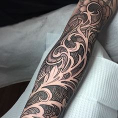 a person with a tattoo on their arm