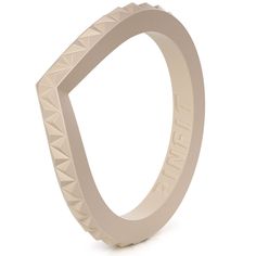 a white ring with an intricate design on the front and back side, against a white background