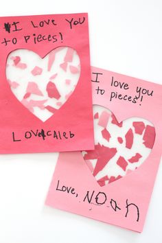 two valentine's day cards with hearts cut out of paper and handwritten i love you to pieces