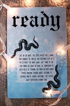 a poster with an image of a snake on it's back and the words ready written in black