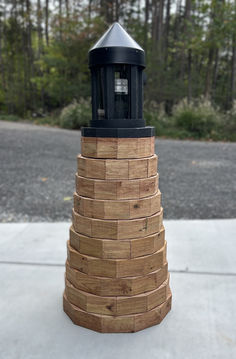 lighthouse built out of pressure-treated lumber 2 x 4's Diy Lighthouse Crafts, Pump Cover, Well Pump