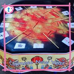 a chinese new year's card game on the ground